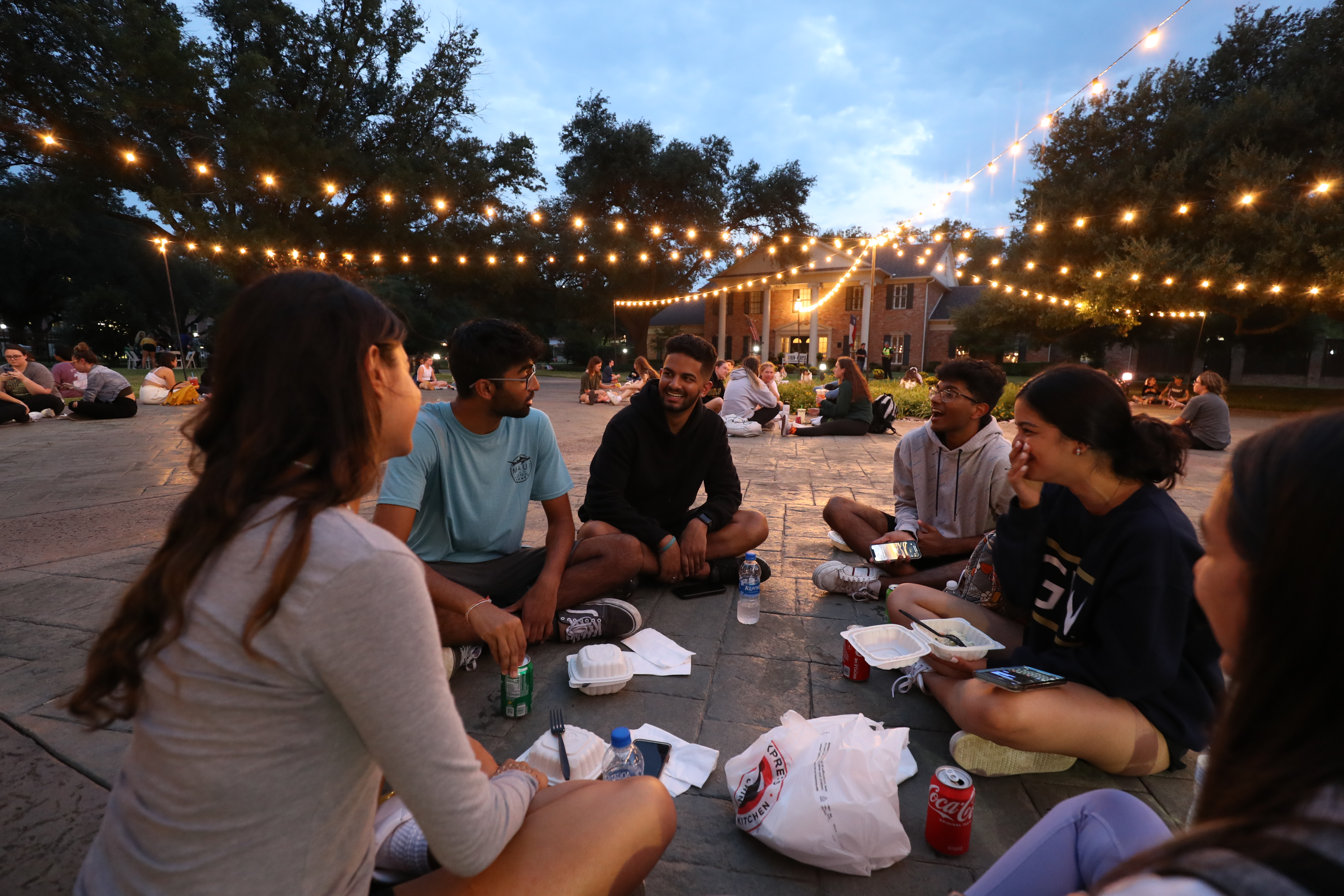 students talking in a circle